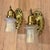 Vintage stamped brass professionally polished and lacquered sconces rewired and supporting vintage iridescent etched...