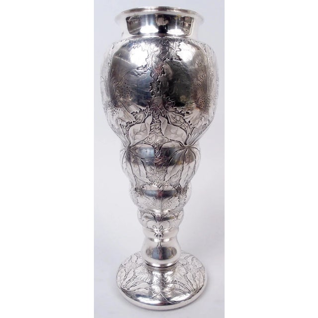 Aesthetic sterling silver vase. Made by Tiffany & Co. in New York. Tapering body with graduated lobing, plain short neck,...