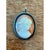 This vintage silver shell cameo captures a refined female profile carved with elegant restraint, her hair swept up and...