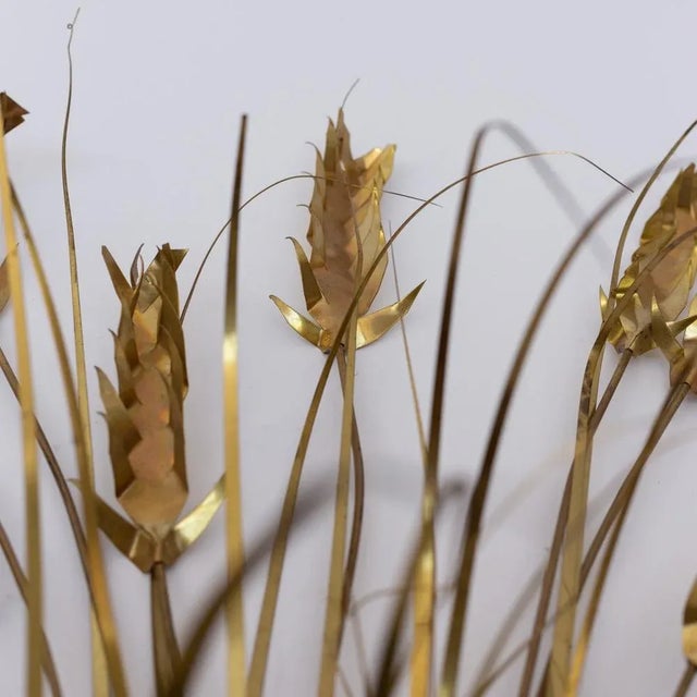 Modernist Belgian wall relief brass art piece bunch of brass water reeds, design by Daniel D'haeseleer, 1960s. The artwork...
