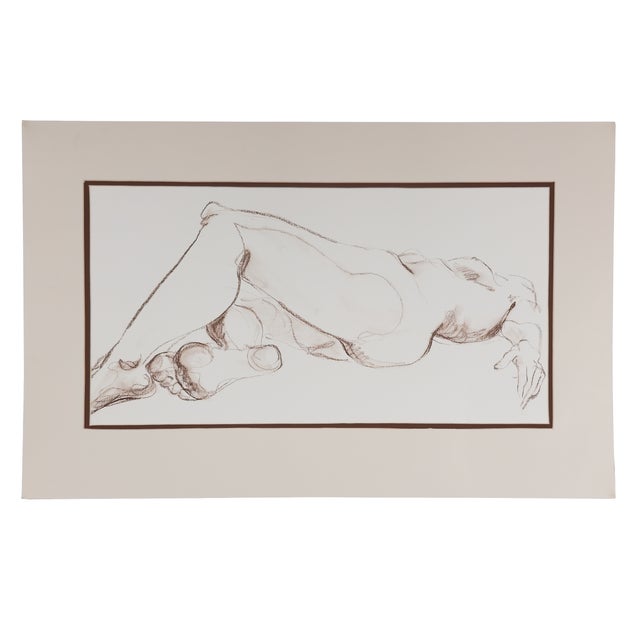 Reclining Nude in Conte* V. Morgan, c. 1980 In Reclining Nude in Conté, V. Morgan uses the economy of drawing to transform...