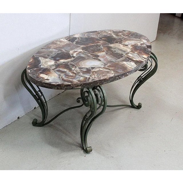 Exciting Coffee Table medium, with structure Wrought Iron, designed in the 1950's. Its oval-shaped tray consists of Marble...