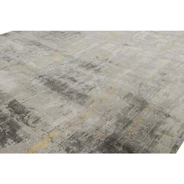 Made with hand-knotted wool and art silk, this 12x20 abstract rug is a bold and exciting new oversized addition to Rug &...