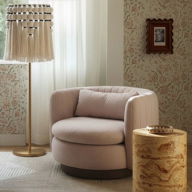 Bring a soft, organic glow into your home with the Tutu Floor Lamp. Its hand-spun natural cotton shade, gently wrapped and...