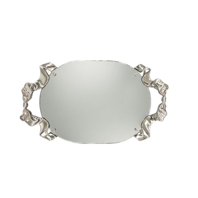 Stunning, 1988 mirrored vanity or serving tray by Godinger, featuring a sculptural silver-plated frame designed as flowing...