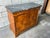 Elegant Louis Philippe French commode dating to the mid-19th century, crafted in richly figured European walnut with four...