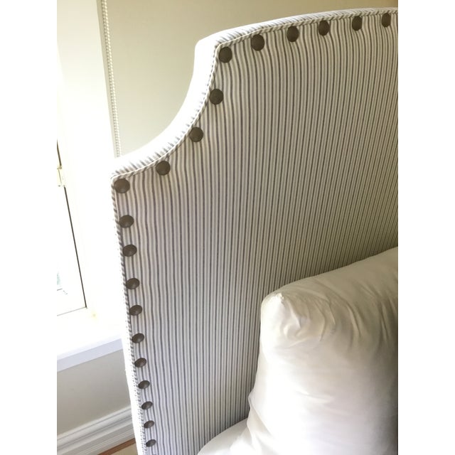 Serena and Lily custom upholstered twin beds. Easy color palette of white, navy blue and light blue in a ticking stripe...