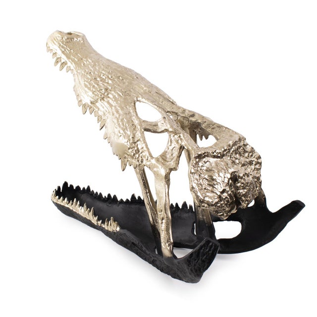 Unveil the intrigue of our dual-tone alligator sculpture, an artful fusion of the wild and the opulent. This striking...