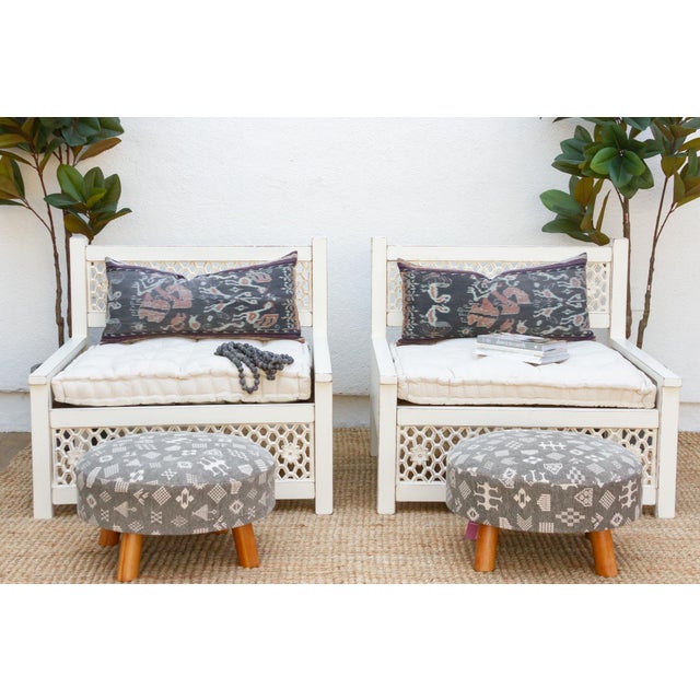 Inspired by ancient Moorish architecture, our custom Jali club chairs feature a finely carved see-through floral panel...