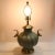 Round fluted painted pale green ginger jar table lamp with dolphin koi handles on each side. Wonderful lamp, high quality...