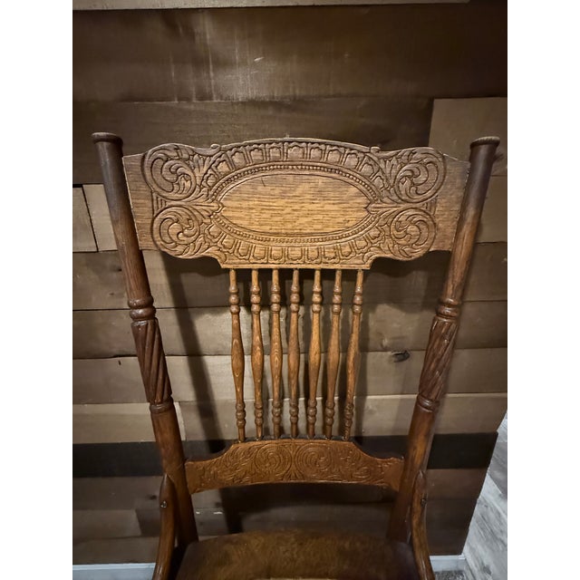 Set of six late 19th-century American Renaissance Revival dining chairs, crafted in solid oak circa 1885–1900. Each chair...