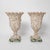 A striking pair of large-scale mosaic shell and glass urns in a dramatic trumpet form, dating to circa 1990. Each urn...