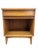 This vintage mid-century modern nightstand features clean lines, tapered legs, and a warm blonde finish. The design...