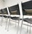 A magnificent set of 5 black leather SE06 chairs on a brushed and chromed metal frame. Designed by Martin Visser for ’t...