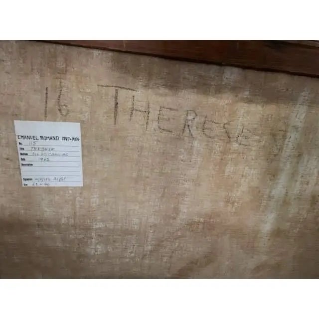 An oil on canvas titled in verso ‘Therese’ by E.Romano. Scene depicts a woman seated in a wingback chair. Strong use of...