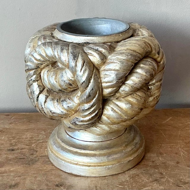 Add a touch of nautical glamour and sculptural interest to your home with this substantial vintage vessel. Defined by its...