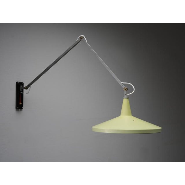 Rare original Panama wall lamp by Wim Rietveld, preserved in outstanding original condition with intact original yellow /...