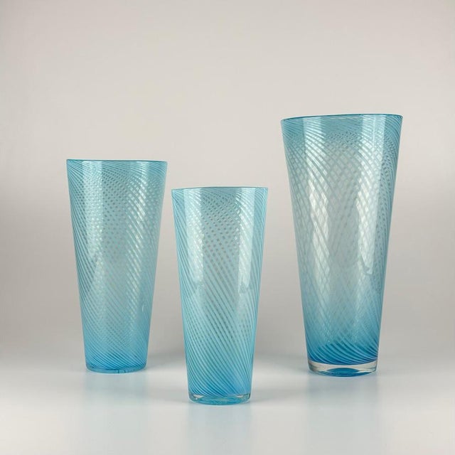 A refined and visually striking set of three Murano glass vases, designed in the style of Gio Ponti and dating to the...