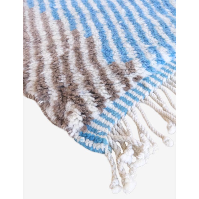 Moroccan Beni Mrirt Wool Rug – Geometric Elegance for Modern Homes This Moroccan Beni Mrirt Wool Rug measures 10.1 x 7 ft...
