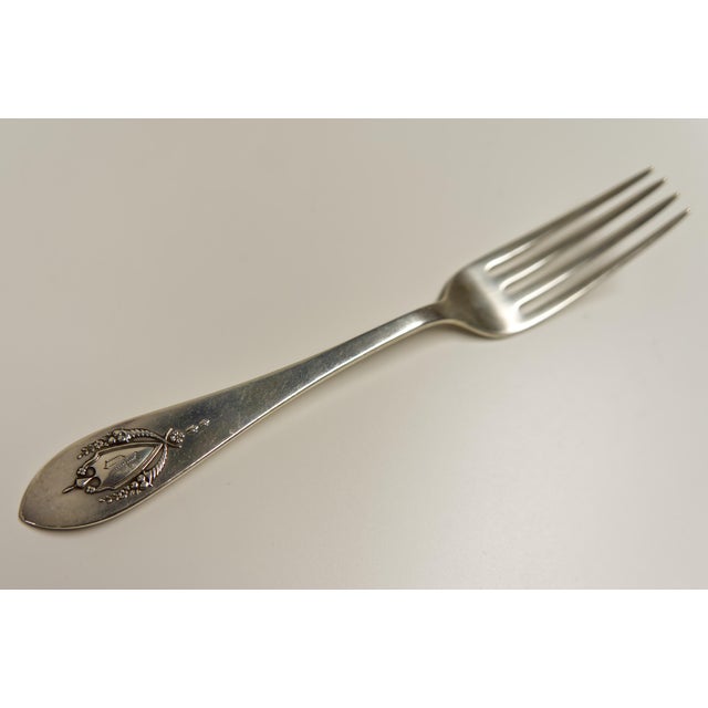 Early 20th-century sterling silver flatware set by Lunt RLB (Rogers, Lunt, Bowlen) of Greenfield, Massachusetts. The set...