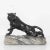This bronze tiger sculpture on a stone was made in France, and will make an impressive statement in any interior space....