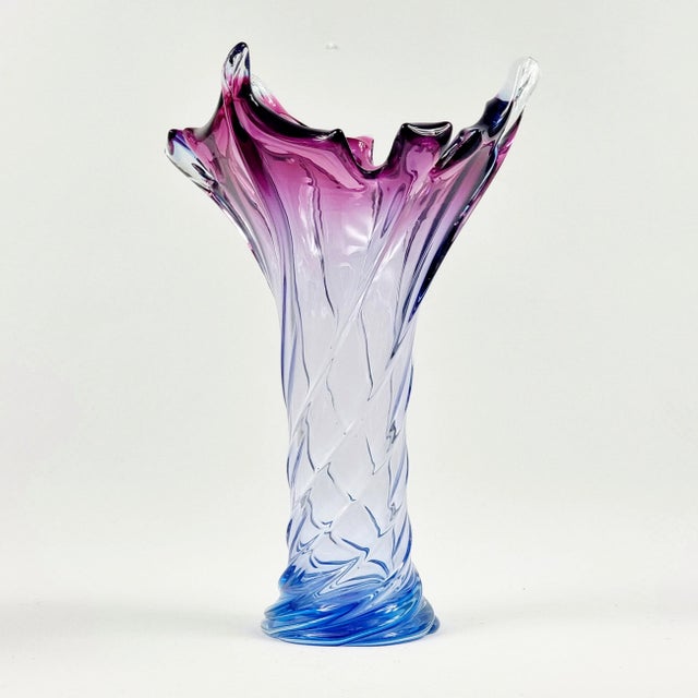 Stunning "twisted" mid-century modern Murano glass vase attributed to Fratelli Toso (Italy, 1960s). Made of thick blue,...