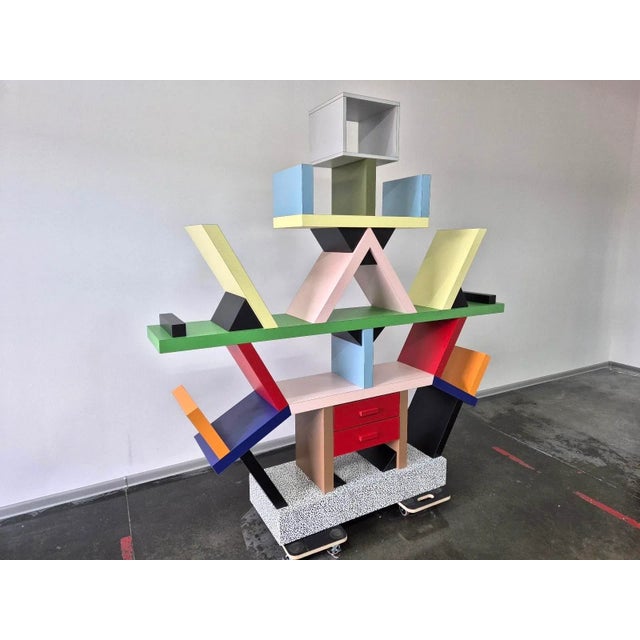 The Carlton Library was designed in 1981 by Ettore Sottsass for Memphis. Despite its unstructured appearance, this...