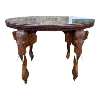 Antique Anglo-Indian Hand Carved Elephant Head Figures, Glass Top Oval Table For Sale