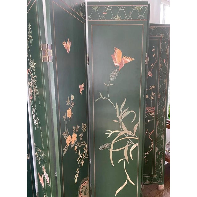 Lovely 20th century two-sided Japanese screen with 6 panels portraying flora & fauna. Birds, branches, and flowers are...