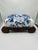 This is a charming antique footstool, beautifully reupholstered in a bold vintage Schumacher fabric. Structure • Frame:...