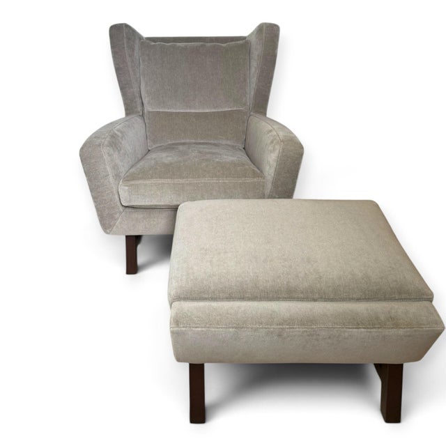 Comfortable Lounge chair and Ottoman from American designer Ted Boerner. The Scoop chair has a graceful sloping form, back...
