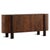 Rich in texture and sculptural character, this sideboard showcases a striking hand-carved surface that highlights the...