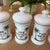 Set of 4 Antique Porcelain Apothecary Jars With Hand Painted Palm Tree and Serpent Decoration For Sale - Image 4 of 12
