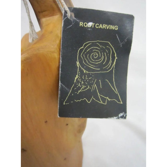 Oversized carved Burwood Bucket with original tag still attached. Carved from a single piece of wood, it is signed by the...