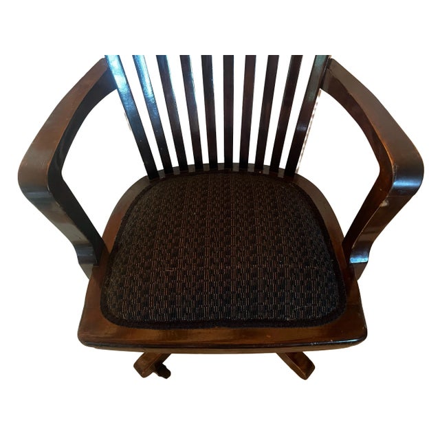 For your consideration, this bankers chair both swivels and rocks with an adjustable spring to control the tension on the...