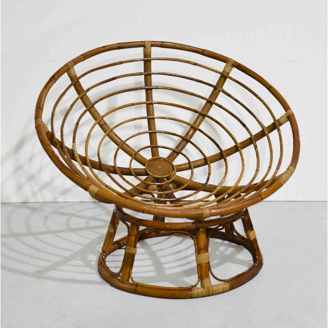 A fresh take on a laid-back classic. This vintage papasan chair features a sculptural rattan and bamboo frame with an...