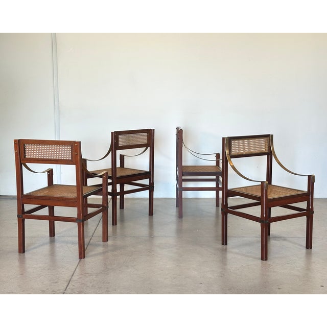 Set of 4 1970s chairs, wooden frame, seat and backrest in Vienna straw, armrests and other elements in brass