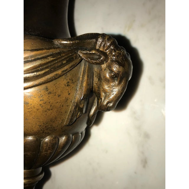 Figurative 19th C. Urns on Marble Stands Bearing Cherubs & Rams Heads - a Pair For Sale - Image 3 of 13