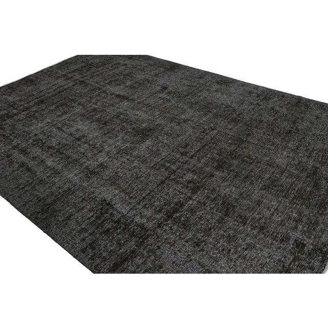 Hand knotted in wool circa 1970-1980, a 9×12 vintage Persian rug from Rug & Kilim’s newest curations. On the Design: The...