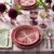 Cast in the trompe l'oeil majolica tradition, each plate is molded and hand-painted to read as an open radicchio leaf —...