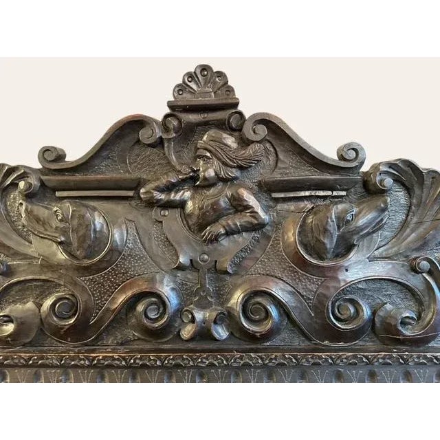 A 19th century Neo Renaissance hunt sideboard from a castle in Germany, with wonderful carvings — 2 drawers and a cubby. A...