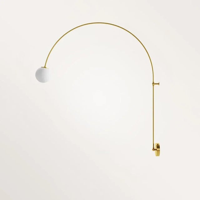 Handmade artemis wall lamp by gobo lights dimensions: 90 l x 12 l x 100 h materials: brass, opaline this lamp takes the...