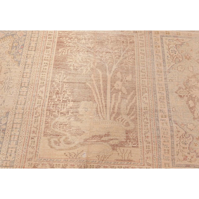 This rare and exquisite 1880s Antique Turkish Rug presents an exceptional example of Ottoman textile artistry. Its...