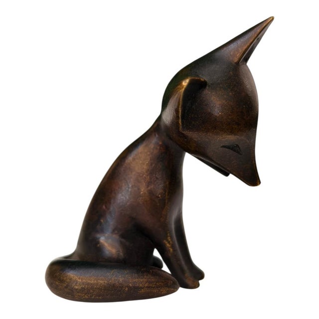 This is a small fox figurine made of patinated brass from the Hagenauer workshop in Vienna, dating from the 1940s or...