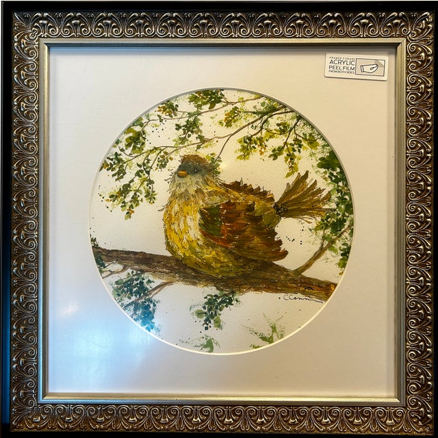 Framed original watercolor ink and wash painting of “Poofy Bird.”The custom round mat has a 12 inch round opening and 15 x...