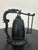 Vintage Japanese cast iron temple-style bell featuring an elaborate dragon-form support and suspended striker. Standing...