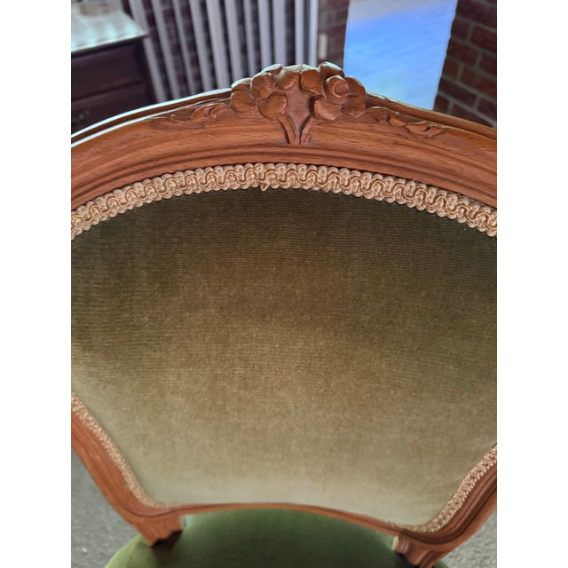 Antique Walnut Louis XV style accent chair in excellent shape. Green upholstery and carved walnut wood.