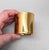 1980s goldtone with "stitching" slide on wide cuff bracelet. Marked "MONET ©" on the inside. Measures: 1 15/16 inches tall...