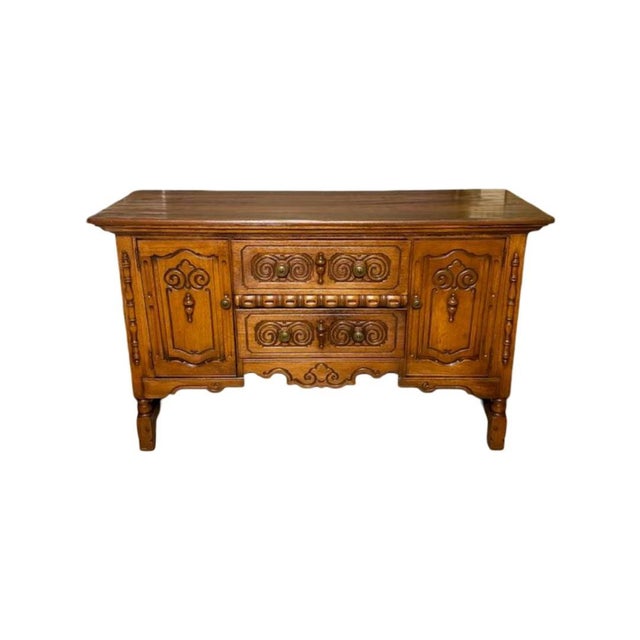 Antique c.1920's Louis XV style Buffet / Sideboard. Features ornate hand-carved panels, decorative moldings, and a...
