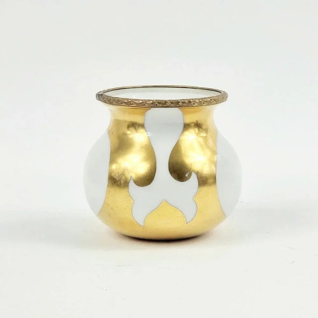 Beautiful Sevres porcelain vase (France, early 20th Century). Gilt bronze rim. The vase is extremely decorative and would...